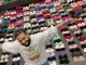 Rapper, Drake poses with all the bras he collected from his tour
